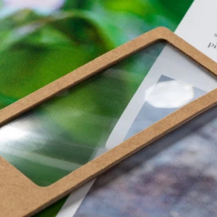 Förstoringsglas av återvunnen kartong - neutral